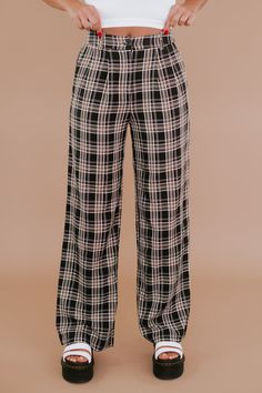 The Streetwear Plaid Pants are featured in a straight leg style fit with a black body & white/taupe plaid pattern. This piece has functional pockets and a high rise fit and looks ideal paired with your favorite graphic tees and bodysuits. Waistband: high-waisted Fabric: 85% Polyester, 10% Cotton, 5% Spandex Functional pockets High rise fit Straight leg style fit with a black body & white/taupe plaid pattern Imported Fit: True to size! Model Specs: Emily is wearing a size small in the photo.(Typical Sizing - Karli: S-Size 5/26 - 5ft 2in, Emily: S-Size 3/25 - 5ft 5in, Syd: L/XL- Size 15/ - 5ft 8in)Need help with sizing? No problem! Join our VIP group on Facebook, Everyday Chic Boutique VIP Insiders to chat directly with our team and other customers just like you.Packaged with love and shippe Chubby Girl Outfits, Plaid Pant, Dark Academia Clothes, Academia Clothes, Online Closet, Black Gifts, Vip Group, Everyday Chic, Black Body