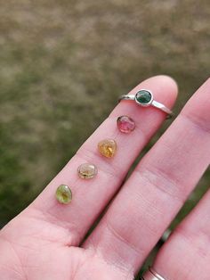 This gorgeous stackable ring features a beautiful little tourmaline gemstone set in a handcrafted bezel cup sitting atop a lightly hammered argentium silver band. Best part is, you get to choose your own stone! You let me know which stone you prefer from 1-4 and I'll make you a ring that looks like the example, but with the stone of your choice. You get to be part of the creative process with me! Gemstones measure between 5x6mm-5x7mm Follow this link to enter my shop: https://www.etsy.com/shop/barebranchjewelry Follow these links to see some of my other gemstone pieces: Teal moss kyanite: https://barebranchjewelry.etsy.com/listing/1267901671/moss-kyanite-ring-celestial-silver Herkimer diamond stacker: https://barebranchjewelry.etsy.com/listing/729433702/herkimer-diamond-ring-silver-solitai Tourmaline Ring With Natural Stones, Tourmaline Natural Stones Ring Jewelry, Tourmaline Natural Stones Ring, Anniversary Tourmaline Jewelry With Natural Stones, Tourmaline Birthstone Ring Gift, Tourmaline Birthstone Jewelry For Promise Ring, Stackable Tourmaline Jewelry For Anniversary, Tourmaline Birthstone Gemstones As Gift, Tourmaline Birthstone Ring Perfect As A Gift