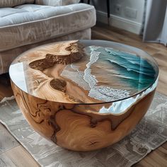 a wooden table sitting on top of a rug next to a couch