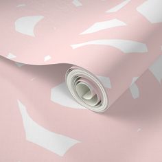 a pink and white wallpaper with an abstract floral design on it's surface