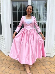 "Presenting Historywearz™ Angelica Schuyler inspired Costume/Dress! This dress is made in beautiful, high-quality machine washable, poly-satin fabric. Your girl will love to wear it for special occasion or \"become\" this beautiful 'Hamilton The Broadway Play\" character:-) The long dress is made from a beautiful poly-satin. The back opens with a zipper, and includes a beautiful back bowed sash (please let us know if you prefer not to have the back sash), there is pretty white lace trim on the e Pink Fitted A-line Gown, Pink Fitted Gown For Costume Party, Fitted Pink Gown For Costume Party, Pink Fitted Victorian Dress For Costume Party, Pink Fitted Ball Gown Corset Dress, Pink Fitted Corset Ball Gown Dress, Pink Fitted Corset Dress Ball Gown, Pink Fitted Corset Ball Gown, Victorian Fitted Dress For Costume Party