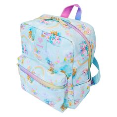 Journeying to Care-a-Lot™? Stop by the Forest of Feelings™ in style with our Loungefly Care Bears™ Cousins All-Over Print Nylon Small Square Mini Backpack. This handy backpack features a soft sky-blue background and plenty of colorful prints of the Care Bears Cousins. You might be able to spot various scenes of rainbows, clouds, rainbow cloud sailboats, and frosty pink and blue trees with rainbow trunks. Playing among them, you’ll find Cozy Heart Penguin™, Lotsa Heart Elephant™, Brave Heart Lion