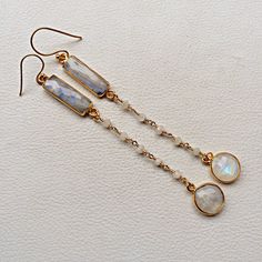 Fine Quality Faceted Rainbow Moonstone Gemstones , Beads Handmade Long Earring With Sterling Silver & Gold Plated . Gemstone - Rainbow Moonstone , Beads Stone Size - , mm ( approx ) Stone Shape - Rectangle , Oval , Beads Size - mm Cut - Faceted QTY - 1 Pair in this listing. #2061 ( Sizes are close approximation ) Please see more 925 Sterling Silver Earring :- http://www.etsy.com/shop/finegemstone/search?search_query=earring &order=date_desc&view_type=gallery&ref=shop_search We al Adjustable White Crystal Earrings For Gift, Moonstone Beaded Jewelry For Gifts, Beaded Moonstone Jewelry Gift, Beaded Moonstone Jewelry For Gifts, White Gemstone Dangle Crystal Earrings, White Gemstone Crystal Dangle Earrings, Dangle Crystal Earrings With Gemstone Accents As Gift, White Dangle Jewelry With Gemstone Accents, White Moonstone Jewelry With Gemstone Accents