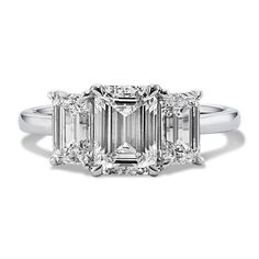 Add bold sparkle to any look with this lab-grown diamond ring. Crafted in bright 14-karat white gold  its classic three-stone design features one emerald cut center stone and two emerald cut side stones. Bands For Emerald Cut Rings, Wedding Bands For Emerald Cut, Emerald Cut Three Stone Engagement Ring, Cut Rings, Emerald Cut Rings, Emerald Engagement Ring Cut, Step Kids, Stone Design, Three Stone