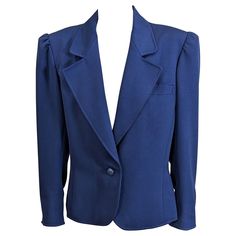 Yves Saint Laurent Puff Sleeve Blazer in deep blue faille. YSL cuts the best blazers around. Strong shoulders with the body of the jacket grazing over the body as opposed to tight. Single button closure. A forever wardrobe staple. Size 42 France. 1990's France. Luxury Vintage Blue Blazer, Strong Shoulders, Rive Gauche, Deep Blue, Wardrobe Staples, Puff Sleeve, Blazer Jacket, Yves Saint Laurent, Tights