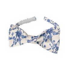 These elegant and artistic floral ties are based on an 18th century French toile design, but they are made from a modern material -- recycled plastic water bottles! Milled to look and feel like silk, these eco-friendly ties are printed instead of dyed with chemicals like silk is. That makes them far better for the environment. The color is fully customizable, making this artistic design perfect for weddings. Our Floral Toile bow tie is a great match for a checked shirt or a navy jacket. Elegant Floral Print Adjustable Suit And Tie Accessories, Elegant Adjustable Suit And Tie Accessories With Floral Print, Elegant Adjustable Floral Print Suit And Tie Accessories, Elegant Summer Patterned Ties, Elegant Patterned Summer Ties, Classic Blue Tie With Butterfly Knot, Elegant Summer Floral Print Ties, Elegant Floral Print Summer Ties, Elegant Patterned Tie With Floral Print