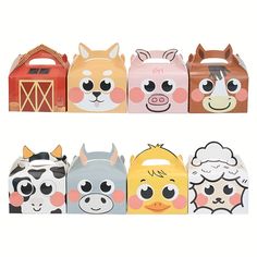 the farm animals are lined up on the shelf next to each other and have faces painted on them