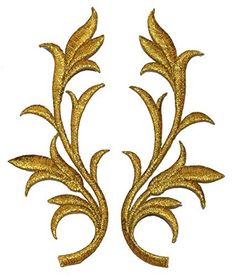 two gold leaves on a white background