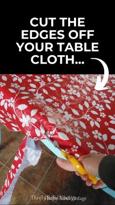 someone cutting fabric with scissors on top of a cloth covered tablecloth that says cut the edges off your table cloth