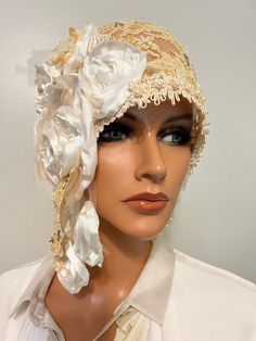 This is beautiful Ladies  flapper hat , headdress, wrap is in antique flapper style daytime hat  has my handmade design is in version of my collection fabulous 20's  and Modern style hats ,heirloom"LudasHatBoutique". Ladies wrap for any occasions. You can wear it many different ways with any dress and will look great costume outfits Era. Asymmetrical hat is made  one of kind cream coffe/ yellowish lace , NOT stretchy lace,handmade floral,  embroidery pearls/glass, antique  trim, pleated floral is in Millinery artwork antique style, nostalgia Wedding 20s , fully stitching by  hands . You can wear it many different ways with any dress and will look gorgeous. This charming piece will fit heads to measure one size fits 23.8"  . Mannequin head is 22". Only hat. Check my other items and maybe yo Flapper Style Fascinator For Vintage Events, Vintage Gatsby Style Hat Headpiece, Gatsby Style Hat For Vintage Events, Adjustable Gatsby Mini Hats For Vintage Events, Adjustable Gatsby Style Headpieces For Church, Gatsby Style Cloche Hat For Kentucky Derby, Adjustable Gatsby Style Hats For Kentucky Derby, Gatsby Style Adjustable Costume Hats For Kentucky Derby, Adjustable Gatsby Costume Hats For Kentucky Derby