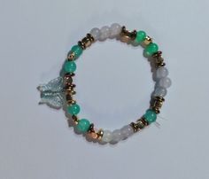 A fancy looking bracelet but cute and affordable. Butterfly Bracelet, Gold Butterfly, Jewelry Bracelets, Handmade Items, Beaded Bracelets, Bracelet, Green, Silver, Gold