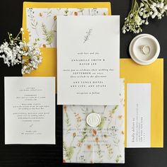 the wedding stationery is laid out and ready to be used