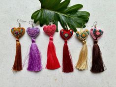 All of our earrings are made with sterling silver hooks, they are made of 925 sterling silver and the clasps of the earrings are made of transparent silicone. Especially for people with mild sensitivity. Beaded earrings, mexican earrings, huichol art, gift for her. We ship anywhere in the word, from Tepic, Nayarit,  mx. Handmade Artisan Heart Earrings, Unique Handmade Heart Earrings, Artisan Embroidered Jewelry For Gift, Handmade Heart-shaped Earrings For Her, Handmade Heart-shaped Earrings As A Gift For Her, Small Handmade Earrings For Gift, Traditional Handmade Earrings As Gift, Handmade Adjustable Small Earrings, Embroidered Drop Earrings As Gift