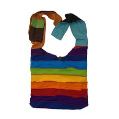 These bright, colorful, handcrafted bags make a great gift. Spacious and comfortable, they are perfect for travel or a casual day out. Available as shoulder bags or backpacks. Shoulder bags have a both a zipper and button closure, as well as an extra inside zipper pocket. Backpacks have a button and drawstring closure, adjustable straps, and loop for hanging. Please choose style in selection menu. Photos show examples of bag styles. Colors are miscellaneous and will vary. Made of 100% cotton. Colorful Bohemian Bags As Gifts, Colorful Bohemian Bags For Gifts, Colorful Bohemian Bags Perfect As Gifts, Eco-friendly Multicolor Festival Bag, Trendy Rainbow Travel Bag, Rainbow Shoulder Bag For Everyday Use, Hippie Cotton Shoulder Bag For Travel, Rectangular Multicolor Beach Bag For Everyday Use, Multicolor Mobile Phone Pouch Bag