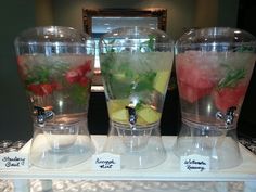 three glasses filled with different types of drinks