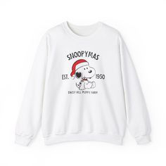 Stay cozy and festive during the holiday season with this Snoopymas Christmas sweatshirt. The medium-heavy fabric blend of 50% cotton and 50% polyester provides ultimate warmth, while the ribbed knit collar and classic fit ensure a comfortable and stylish look. Perfect for those who love Peanuts and want to celebrate Christmas in a unique way. Product features - Medium-heavy fabric blend for warmth - Ribbed knit collar for elasticity - Classic fit with crew neckline for comfort - Double-needle s Winter Crew Neck Sweatshirt With Cartoon Print, Winter Cartoon Print Crew Neck Sweatshirt, Casual Cotton Christmas Sweatshirt, Casual Christmas Cotton Sweatshirt, Winter Cartoon Print Tops For Loungewear, Winter Cartoon Print Sweatshirt For Loungewear, Winter Loungewear Sweatshirt With Cartoon Print, Casual Christmas Sweatshirt With Cartoon Print, Winter Cartoon Print Sweatshirt With Relaxed Fit