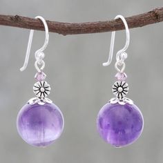 Charmingly feminine, this pair of dangle earrings comes from the talented Kai Kittima of Thailand. The artisan's design features one round amethyst bead, crowned with a sterling silver flower and a shimmering purple glass bead. The designer completes her lovely beaded design with a high polish finish and a sterling silver hook. Diy Earrings Dangle, Lilac Amethyst, Diy Jewelry Necklace, Earrings Diy, Purple Earrings, Earrings Inspiration, Homemade Jewelry, Amethyst Jewelry, Amethyst Beads