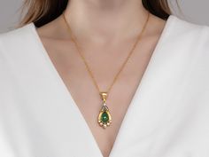 One-of-a-Kind Necklace in 24k/22k/18k Yellow Gold, 15x11mm Teardrop Set in Wide Frame from the Muse Collection, with Emerald Luxury Teardrop Emerald Necklace In Yellow Gold, Gold Pear-shaped Drop Necklace With Gemstone, Gold Pear-shaped Emerald Gemstone Necklace, Pear-shaped Gold Emerald Necklace, Gold Teardrop Drop Necklace With 17 Jewels, Gold Pear-shaped Emerald Necklace Gift, Gold Teardrop Emerald Necklace, Elegant Gold Teardrop Pendant Emerald Necklace, 22k Gold Teardrop Jewelry