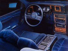 the interior of a car is shown in this ad for an old model, with wood trim and dash boards