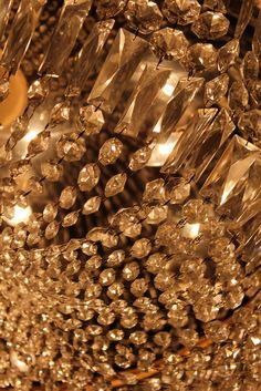 a close up view of some very pretty crystal beads on a chandelier or light fixture