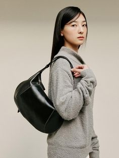 It is a daily bag brand that can be used comfortably every day.- Round shape shoulder bag- Can be worn in three ways: tote, shoulder or cross- Practical design with inner zipper pocket- Length adjustable strap detail Everyday Functional Shoulder Bag With Detachable Handle, Modern Large Capacity Baguette Shoulder Bag, Everyday Black Baguette Bag With Top Carry Handle, Black Baguette Bag With Top Carry Handle For Everyday, Modern Everyday Baguette Bag With Double Handle, Modern Black Baguette Bag With Top Carry Handle, Modern Baguette Bag With Double Handle For Everyday, Modern Double Handle Baguette Bag For Everyday, Versatile Black Baguette Bag For Daily Use