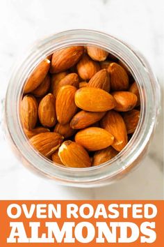 almonds in a jar with text overlay that reads oven roasted almonds and how to use them