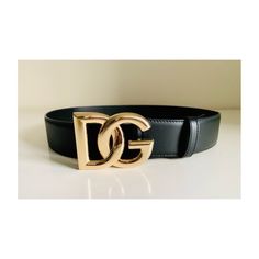 Pre-Owned: Excellent Condition, Like New! First Hole: 31.5 In, Last Hole: 35.5 In, Total Length: 39 In, Add A Touch Of Luxury To Your Outfit With This Dolce & Gabbana Black Leather Waist Belt. The Interlocking Dg Logo On The Buckle Is A Classic And Timeless Accent That Adds A Stylish Element To Any Attire. Made In Italy, This Medium-Width Belt Is Perfect For Those With A Waist Size Of 34-35 Inches, And The Brass Hardware Material Is Durable And Long-Lasting. The Solid Black Color And Simple Yet Designer Black Belt With Gold-tone Logo Plaque, Designer Black Belts With Gold-tone Logo Plaque, Chic Black Belt With Gold-tone Logo Plaque, Elegant Black Belt With Gold-tone Logo Plaque, Designer Party Belts, Leather Waist Belt, Dg Logo, Gold Belt, Gold Belts