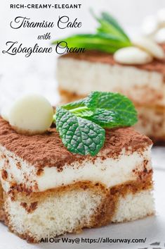 two pieces of cake sitting on top of a white plate with green leafy garnish