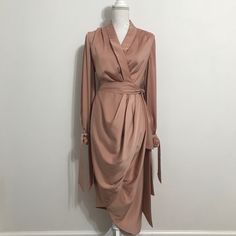 C/Meo Collective Long Sleeve Wrap Dress In Dusty Pink Featuring Elegant Draping And Long Ties At Each Sleeve. About This Closet: Each Item Is From My Current, Personal Wardrobe And Is Well Cared For, Cherished And Gently Pre-Loved! The Price Listed Is The Lowest Price I'm Willing To Give It Up For. For This Reason, I Do Not Consider Offers. If You Love It, Click Buy Now To Make It Yours! Chic Draped Midi Dress For Fall, Pre-draped Long Sleeve Evening Midi Dress, Elegant Viscose Dress With Surplice Neckline, Evening Pre-draped Long Sleeve Midi Dress, Elegant Midi Dress With Surplice Neckline For Brunch, Elegant Viscose Wrap Dress With Surplice Neckline, Long Sleeve Viscose Midi Dress For Party, Pre-draped V-neck Dress For Work, Wrap Midi Dress For Fall Party