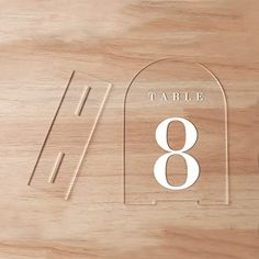 a table number with the number eight on it