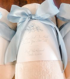 two blue and white wedding shoes with a bow on the front one is for someone who has passed their marriage vows