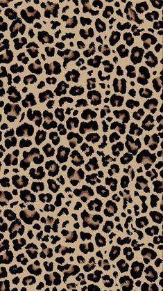 an animal print background with black and brown spots