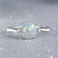 Gender:Women's; Gemstone:Opal; Gemstone Color:Multicolor; Quantity:1PC; Shape:Oval; Style:Classic,Sweet,Birthstones; Jewelry Type:Band Ring; Occasion:Gift,Birthday,Anniversary,Wedding,Party Evening Wear,Daily; Material:Alloy; Ring Size:9,8,7,6,5; Design:Classic; Product Dimensions:0.0000.0000.000; Shipping Weight:0.010; Package Dimensions:1.01.01.0; Net Weight:0.000; Listing Date:09/08/2020; Special selected products:COD; products source:online-scm Opal Jewelry Rings, Gemstone Jewelry Rings, Pearl Ring Blue, Unique Engagement Rings Birthstones, Pastel Blue Rings, Ring With Blue Stones, Opal Ring Handmade, Rock Rings Blue, Anniversary Birthstone Ring