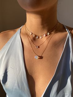 Our radiant teardrop opal necklace is named after Ahurani, the Persian Goddess of Water. Ahurani represents water in all it's many forms - rain, snow, rivers, lakes, and the oceans. Ahurani is a source of life and symbolizes purity, motion, and renewal. DETAILS- Crafted with pure solid 14k yellow gold- Each chain includes 2 adjustable loops- Chain style may vary slightly- Natural, genuine opals- Made in New York*Note:We do our best to choose opals with a rich and vibrant color, however, please n Opal Teardrop Pendant Necklace With Gemstone, Teardrop Opal Gemstone Necklaces, Opal Teardrop Gemstone Necklace, Teardrop Opal Necklace With Gemstone, Gold Opal Necklace With Natural Stones, Gold Teardrop Opal Necklace, Ethereal Opal Gemstone Jewelry, Teardrop Ethiopian Opal Gemstone Jewelry, Gold Opal Teardrop Necklace