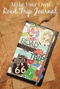 a road trip journal sitting on top of a wooden table