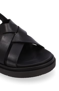 This cushy platform sandal is elevated by a strappy leather upper with an adjustable slingback strap and contoured footbed for all-day comfort. 1" platform (size 39) Leather upper and lining/rubber sole Made in Spain Leather Slingback Heels With Adjustable Straps, Black Leather Strap Sport Sandals, Black Leather Sport Sandals With Strap, Black Strappy Slingback Sandals With Cushioned Footbed, Leather Heels With Ankle Strap And Adjustable Straps, Closed Toe Sandals With Adjustable Strap, Strappy Leather Platform Heels, Leather Strappy Platform Heels, Black Leather Sport Sandals With Open Heel