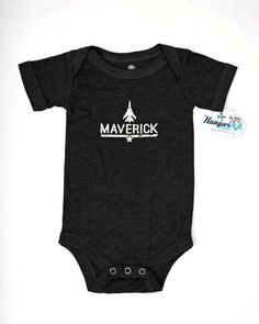 Great for the future pilot! This super soft onesie is made with combed ringspun cotton and features a super cool distressed foil graphic. Snap closures make changing a breeze. Bella Canvas Charcoal Black Tri-Blend Distressed Foil Graphic 3.8 oz., 50/25/25 polyester/Airlume pre-shrunk combed and ringspun cotton/rayon Side seam, Envelope neck, Snap leg closure MADE IN USA Casual Unisex Onesie With Letter Print, Casual Onesie With Letter Print For Loungewear, Casual Cotton Onesie With Letter Print, Casual Cotton Bodysuit With Letter Print, Cotton Graphic Print Onesie For Loungewear, Black Casual Onesie With Graphic Print, Fitted Soft-washed Cotton Onesie, Unisex Casual Onesie With Graphic Print, Casual Onesie With Graphic Print, Gender-neutral