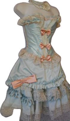 Satin Victorian Dress With Ruffles In Ball Gown Shape, Satin Victorian Ball Gown With Ruffles, Marie Antoinette Style Costume Dress With Ruffles, Marie Antoinette Style Victorian Party Dress With Ruffles, Victorian Satin Dress With Ruffles For Costume, Blue Victorian Dress With Ruffles For Wedding, Victorian Style Ruffled Petticoat For Costume, Victorian Ruffled Petticoat For Costumes, Marie Antoinette Victorian Dress With Ruffles For Costume Party