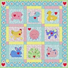 a quilted wall hanging with animals and hearts on the front, in pastel colors