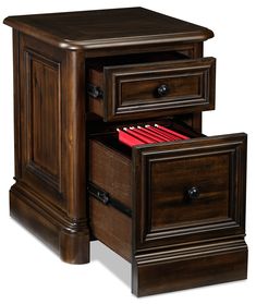 a wooden desk with two drawers and a file cabinet