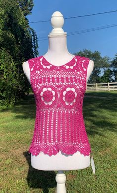 "Lacy Crochet Tank Top.  Great with a camisole underneath or as a bathing suit coverup.  Looks great with jean, shorts, or a skirt.   1. Pink top - made with cotton yarn  - 32\" wide and 20 in\" long from shoulder to bottom. 2. Blue top - made with cotton yarn - 40\" wide and 24 in\" long from shoulder to bottom. 3. Custom order - message me with color Custom Orders usually take about 2-3 weeks to create (not including shipping time). However, depending on the number of orders I have, it could take more or less time to make the item and ship it to you. If you need it by a certain day, feel free to message me and I can let you know if that will be possible!Dress form used is a size medium." Fitted Tops For Summer Beach Party, Beachy Sleeveless Crochet Top For Beach Party, Sleeveless Beachy Crochet Top For Beach Party, Beach Party Sleeveless Crochet Top, Sleeveless Fitted Crochet Top For Beach Party, Bohemian Stretch Tank Top For Beach, Fitted Sleeveless Crochet Top For Beach Party, Fitted Tank Top For Spring Beach Party, Spring Vacation Crochet Tank Top