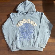 A Blue Sp5der Hoodie Size S Worn Couple Times Reason For Sale Doesn’t Fit Me No More Blue Sp5der Hoodie, Sp5der Hoodie, Sp5der Hoodie Outfit, Blue Cotton Throwback Hoodie, Cozy Blue Hoodie For Streetwear, Washed Blue Hooded Hoodie For Streetwear, Blue Moisture-wicking Hoodie For Streetwear, Buy Hoodies, Hoodie Outfit