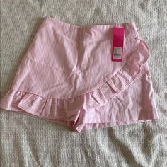 This Is So Adorable! Ruffle Skirt With Shorts Underneath. Zips In Back. Preppy Bottoms For Summer Day Out, Preppy Summer Bottoms For Day Out, Preppy Short Bottoms For Spring, Preppy Bottoms For Beach In Spring, Preppy Spring Short Bottoms, Cute Ruffled Bottoms For Vacation, Cute Ruffled Bottoms For Day Out, Preppy High Waist Spring Bottoms, Cute Fitted Bottoms For Vacation