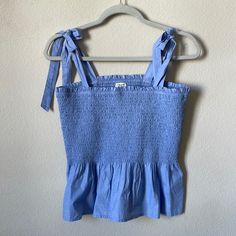 New W/O Tags, Never Worn Casual Cotton Smocked Top For Spring, Casual Smock Top For Day Out, Light Blue Smocked Back Top For Spring, Cotton Smocked Summer Top For Day Out, Blue Top With Smocked Bodice For Brunch, Blue Sleeveless Smocked Top, Blue Vacation Top With Drawstring, Blue Drawstring Top For Vacation, Blue Cotton Smocked Top For Brunch