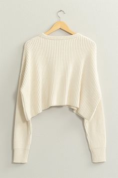 Details CREW NECK CROPPED KNIT SWEATER DROPPED SHOULDERS AND A BOXY RELAXED-FIT SILHOUETTE FURTHER THE LAID-BACK CHARM, Content + Care 100% ACRYLIC Bodycon Dresses Casual, Cropped Knit Sweater, Graphic Tops, Blue Sweaters, Dress Backs, Sweater Jacket, Jacket Tops, Bottoms Pants, Long Tops