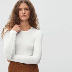 The Pima Micro-Rib Long-Sleeve Crew White – Everlane Classic Crew Neck Long Sleeve Top For Spring, Classic Stretch Tops With Ribbed Cuffs, Fitted Long Sleeve Crew Neck Top For Layering, Fitted Long Sleeve Top With Crew Neck, Classic Stretch Long Sleeve Top With Crew Neck, Fitted Long Sleeve Top With Ribbed Crew Neck, Everlane Crew Neck Top For Spring, Fitted Crew Neck Top With Ribbed Cuffs, Everlane Stretch Tops