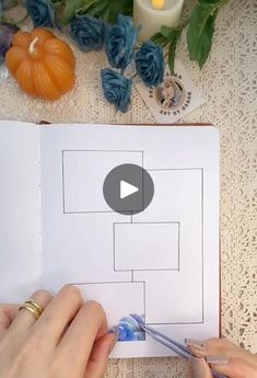 someone is drawing a diagram on a piece of paper with crochet and yarn