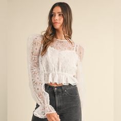 This Top Features A Vibrant Floral Pattern, Enhanced With Intricate Embellishments That Add A Touch Of Sparkle And Sophistication. Spring Party Lace Top With Lace Work, Feminine Sheer Lace Top For Party, Feminine Spring Lace Top For Party, Feminine Lace Top For Spring Party, Feminine Lace Blouse For Party, Feminine Fitted Lace Top For Brunch, Fitted Feminine Lace Top For Brunch, Feminine Lace Top For Party, Party Blouse With Delicate Lace