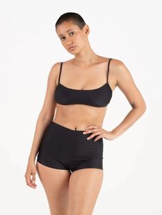 The Maude Top is a versatile bandeau-style separate featuring a strappy cross-tie closure, which can be worn tied at the back or front. Adjustable ruched detailing at the underarms allows for the perfect fit with extra room at the bust for maximum comfort. We love the Maude Top paired with the Tap Short, Tie Bottom, or High Kick for an effortless poolside look. Made in Los Angeles of Italian fabric. 88% recycled Econyl® / 22% Spandex. Short Tie, High Kick, Tap Shorts, Surf Bikinis, Beach Towel Blanket, Surf Suit, Hunza G, Beach Sunglasses, Baby Swimming