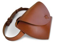 a brown leather case is shown on a white background, with the strap down to it's side